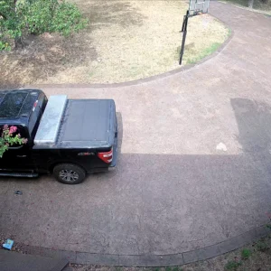 Actual Uniview wide-angle security camera view from a Cloud 504 installation covering a driveway and approach