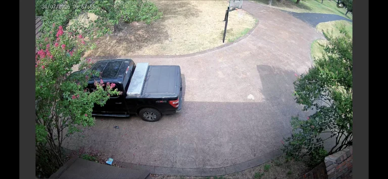 Actual Uniview wide-angle security camera view from a Cloud 504 installation covering a driveway and approach